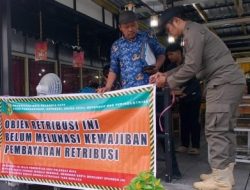 Retribusi Daerah Dipertegas lewat Spanduk Peringatan Visual