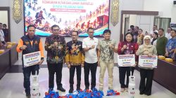OJK dan BI Bersinergi Salurkan Bantuan Penanganan Karhutla Palangka Raya